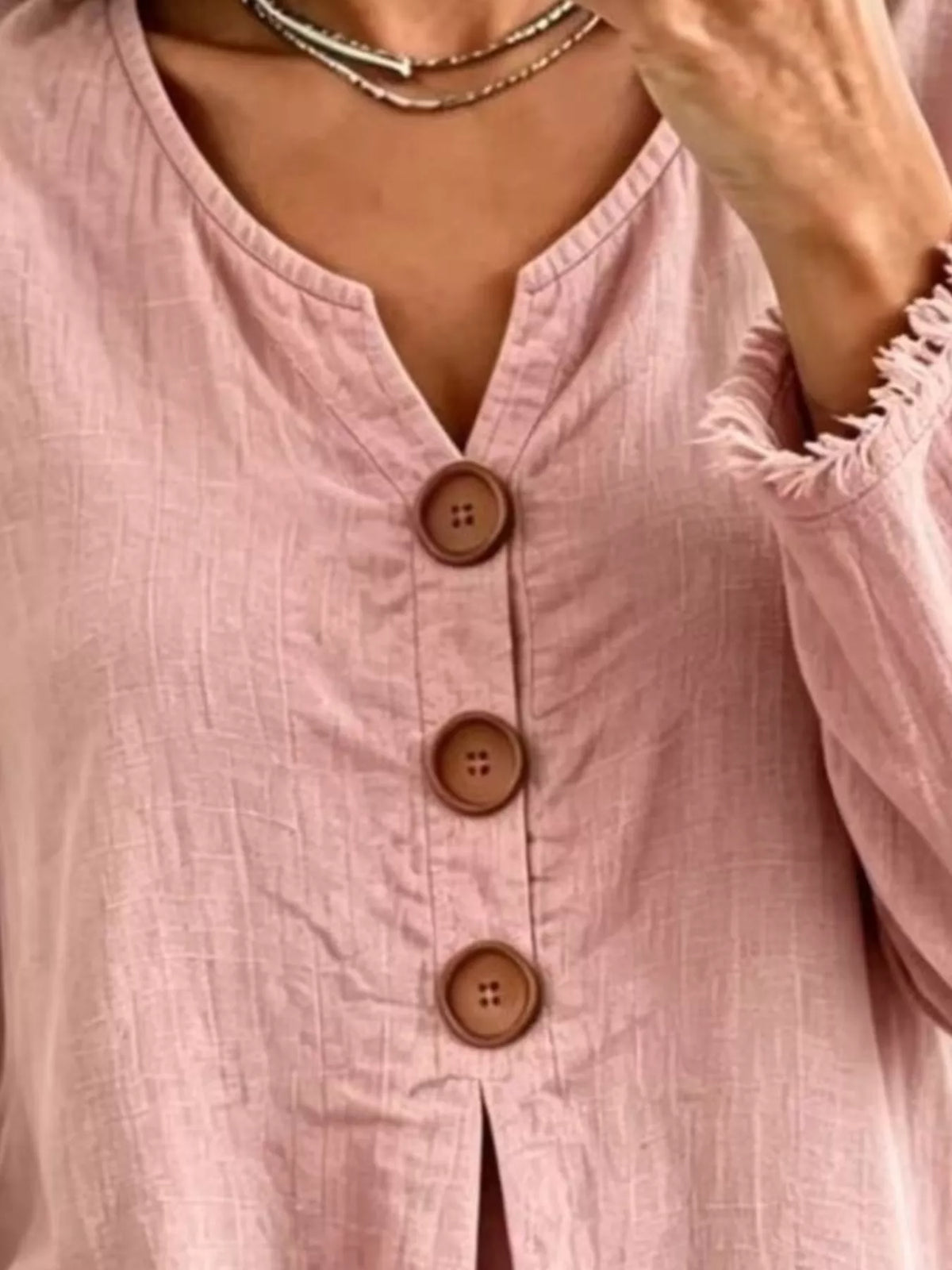 Pink Frayed-Hem Long Sleeve Button-Front Blouse neckline and button detail