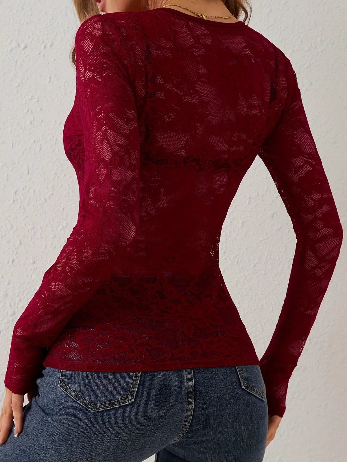 Burgundy sheer floral lace long sleeve top with scalloped V-neck, back view