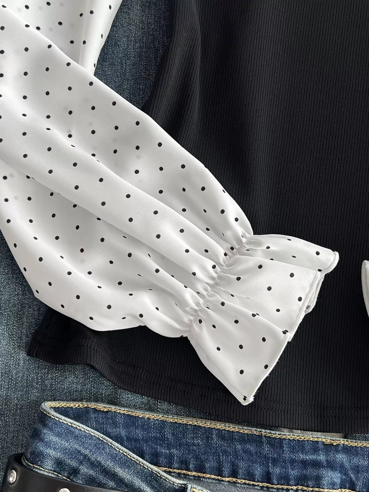 Polka-dot blouse, flounce cuff detail