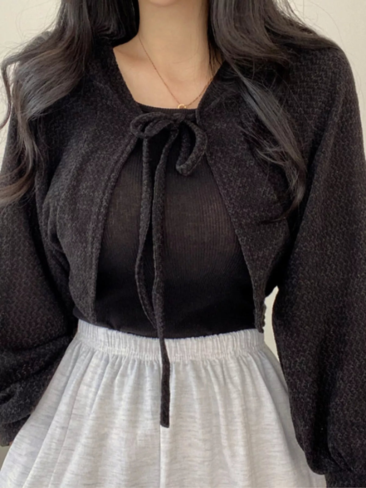 Round neck long sleeve cardigan, front view on model