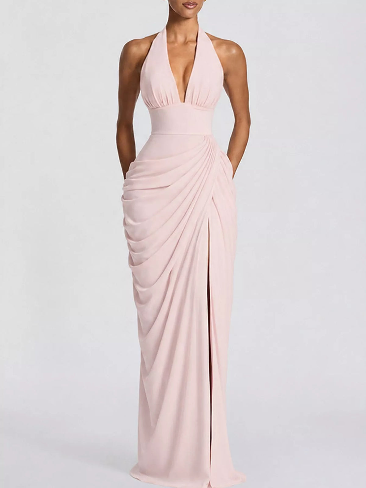 Pink halter neck high-slit maxi evening dress — front view
