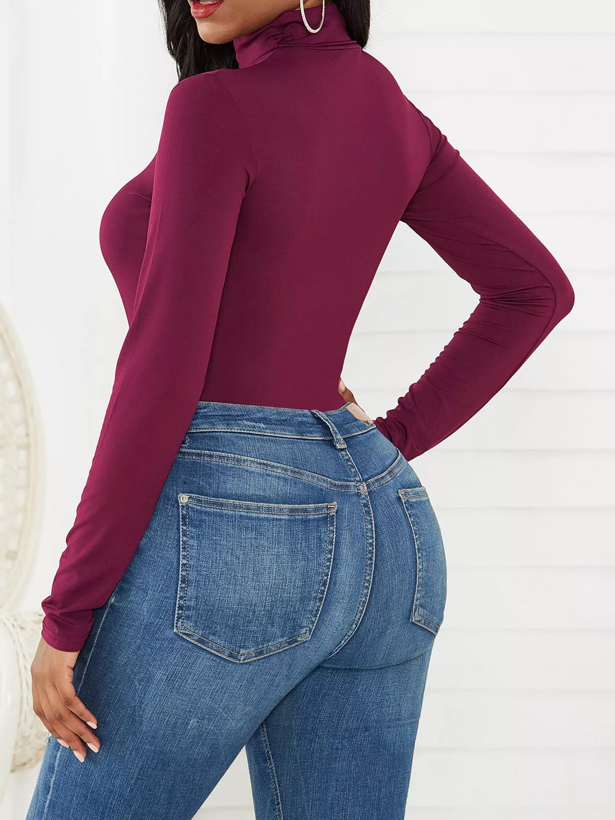 Long Sleeve Turtleneck Slim-Fit Bodysuit, back view in burgundy