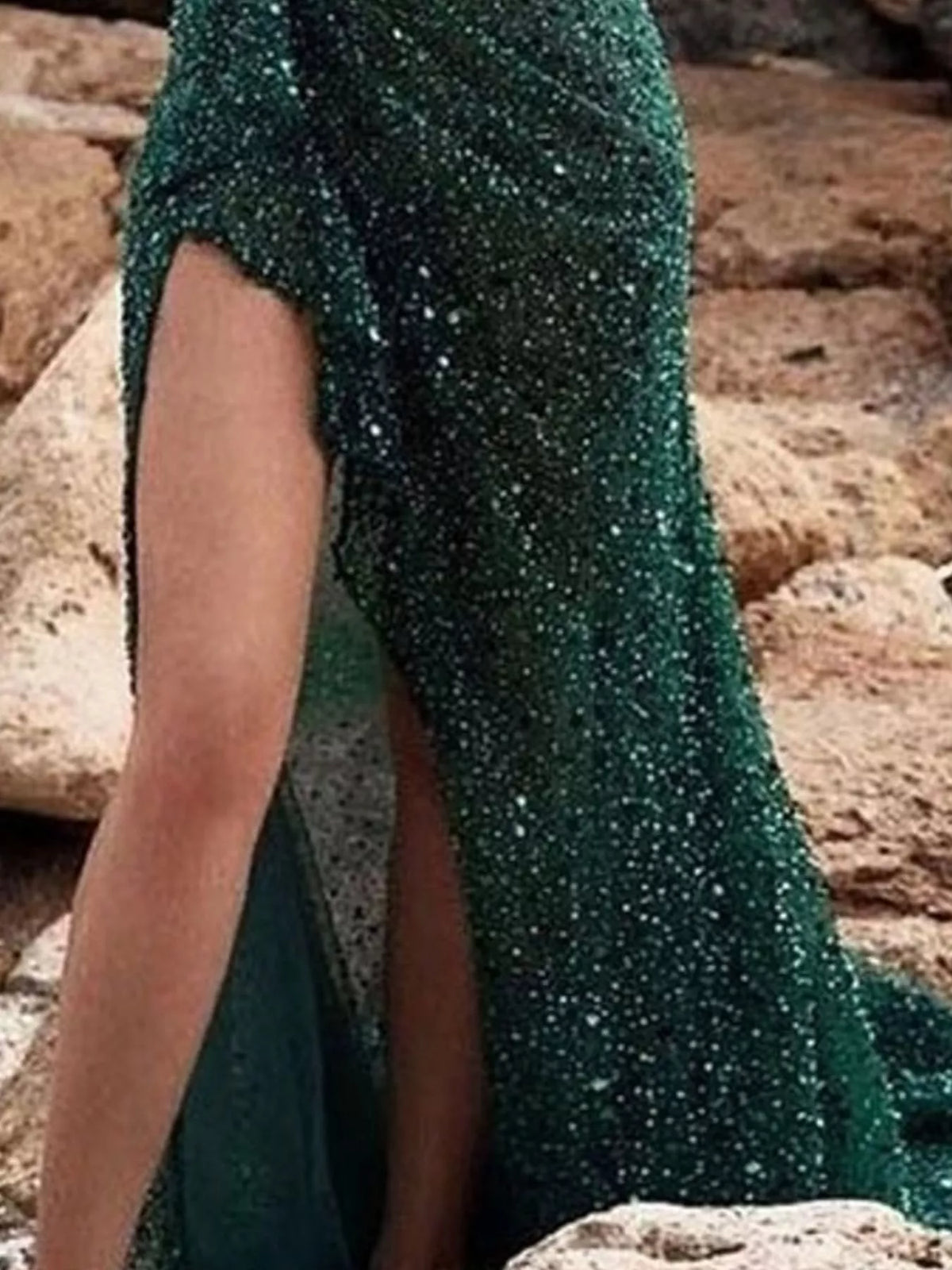 One-shoulder sequin gown, green high slit detail