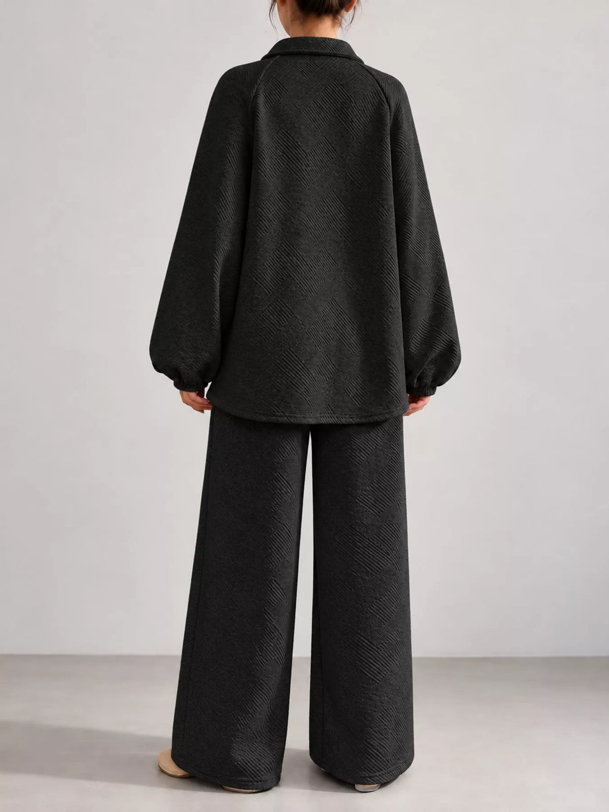 Black textured polo collar top and wide-leg pants set — back view