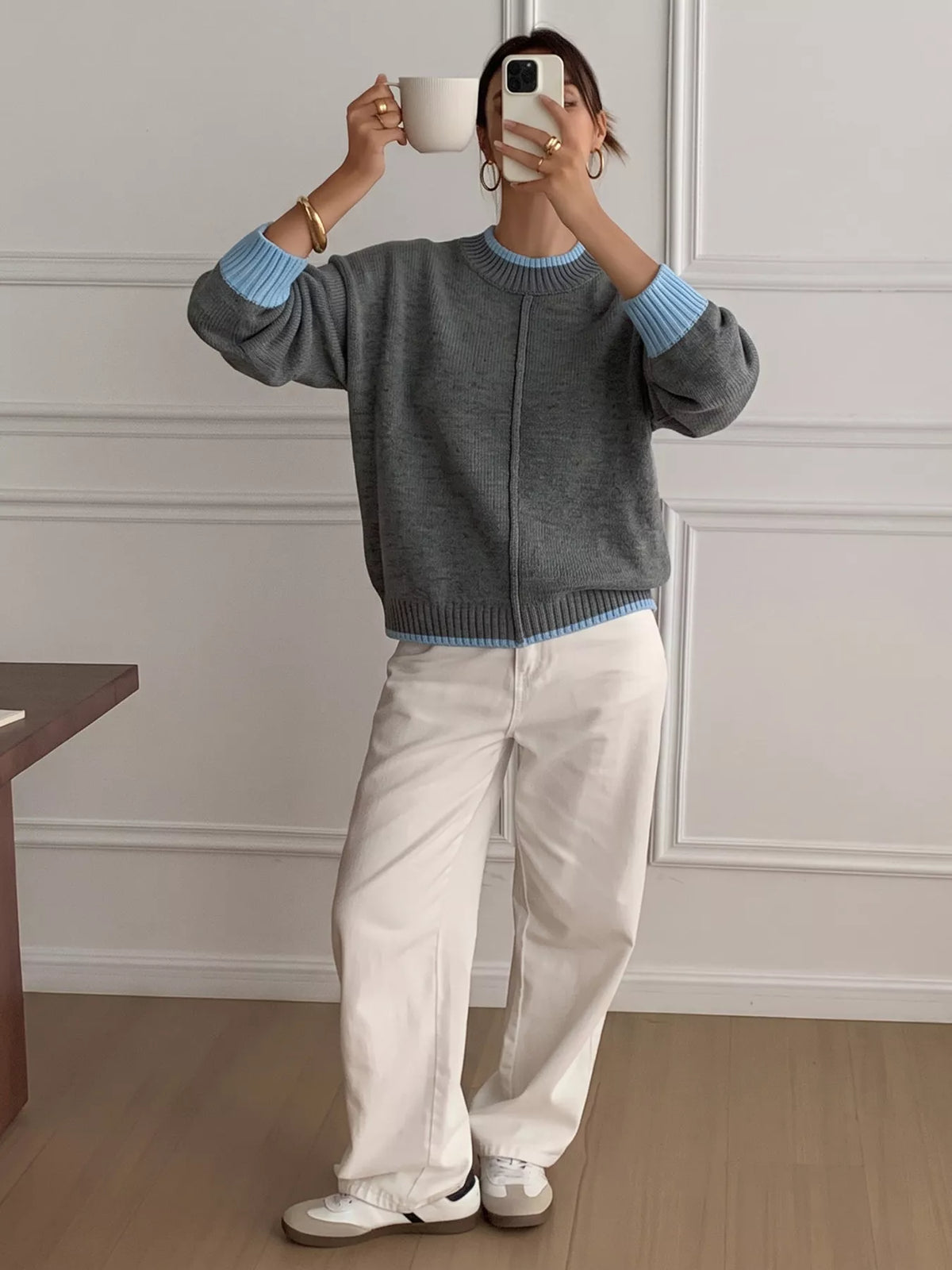 Gray sweater with blue contrast trim, full front view
