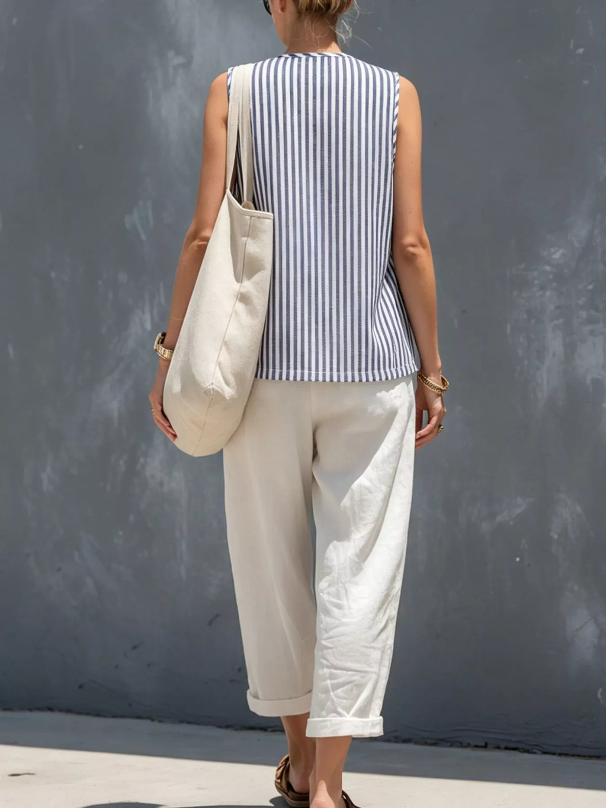Blue-and-white striped vest with white pants striped button-down vest and pants set, back view