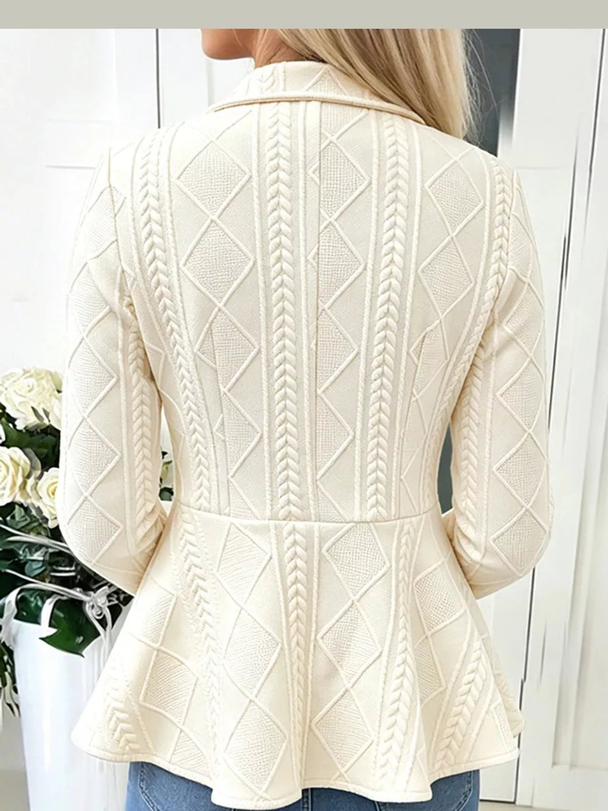 White cable-knit button-up cardigan — back view