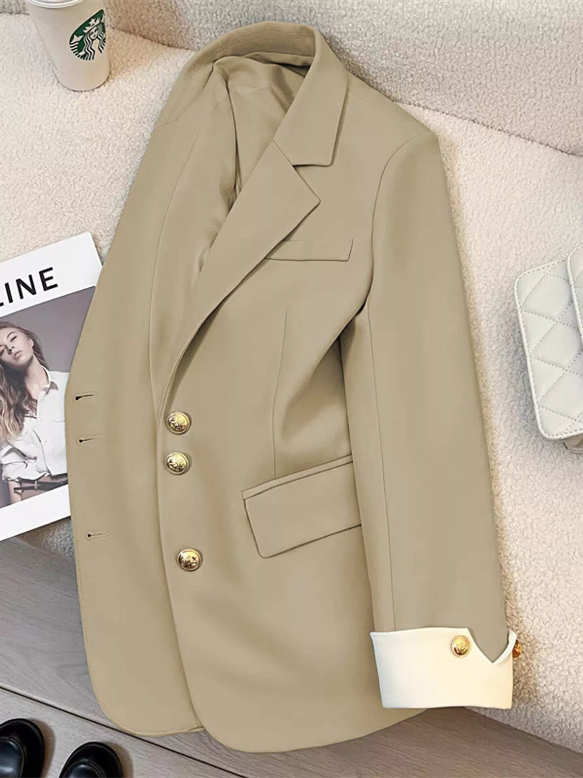 Beige single-breasted blazer with gold-tone buttons