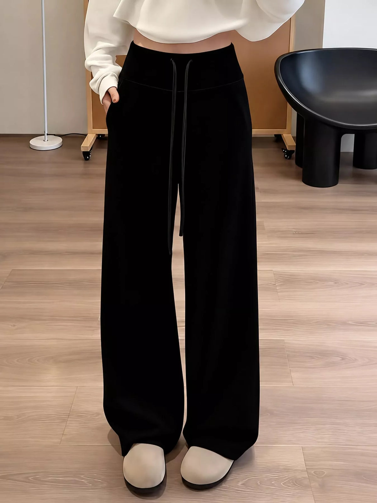 Black drawstring wide-leg pants — front view