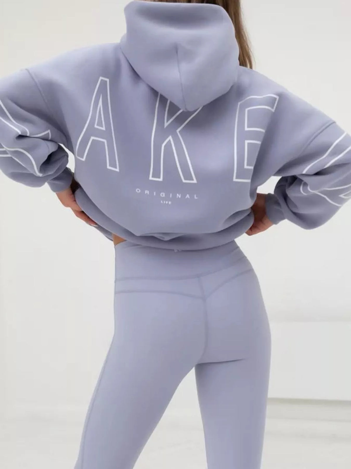 Lavender letter-print pullover hoodie with kangaroo pocket, back lettering view