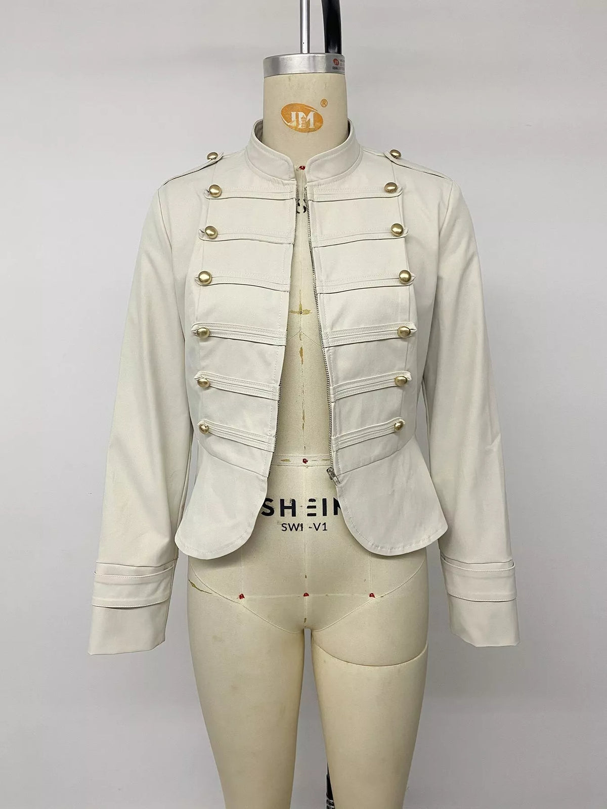 Apricot zip-up cropped jacket, front on mannequin