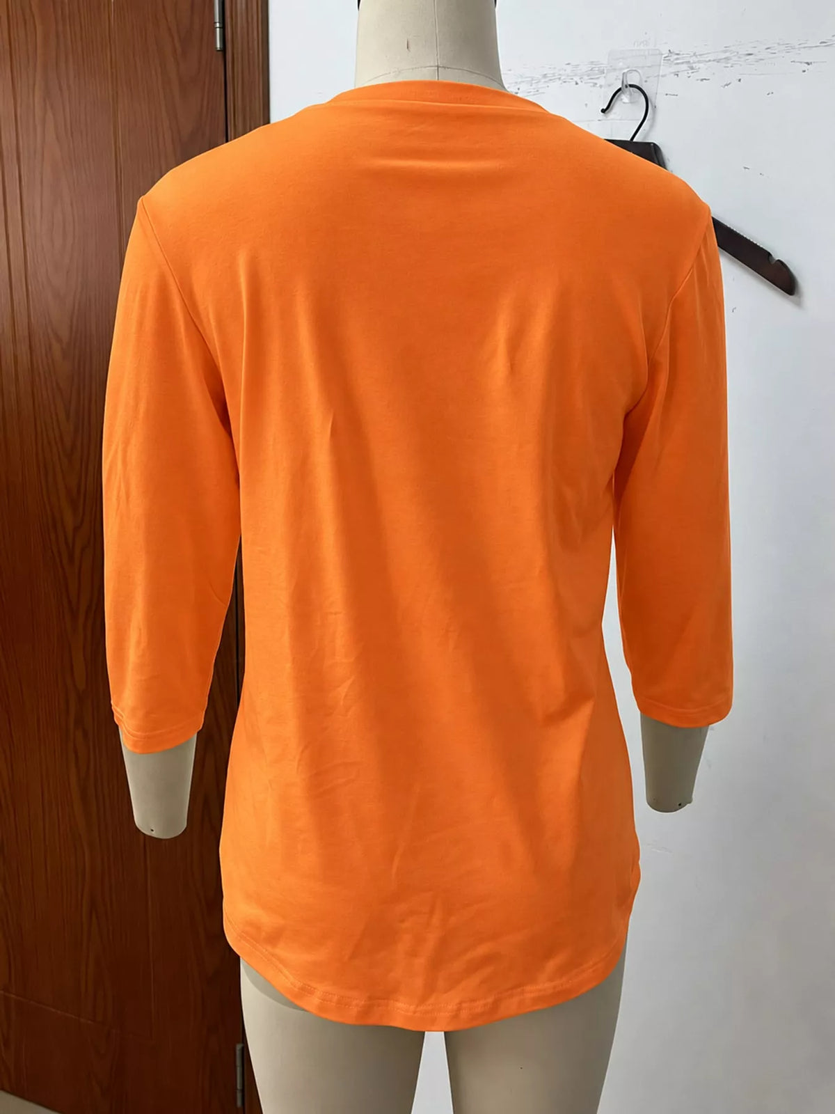 Orange v-neck half sleeve t-shirt, back view