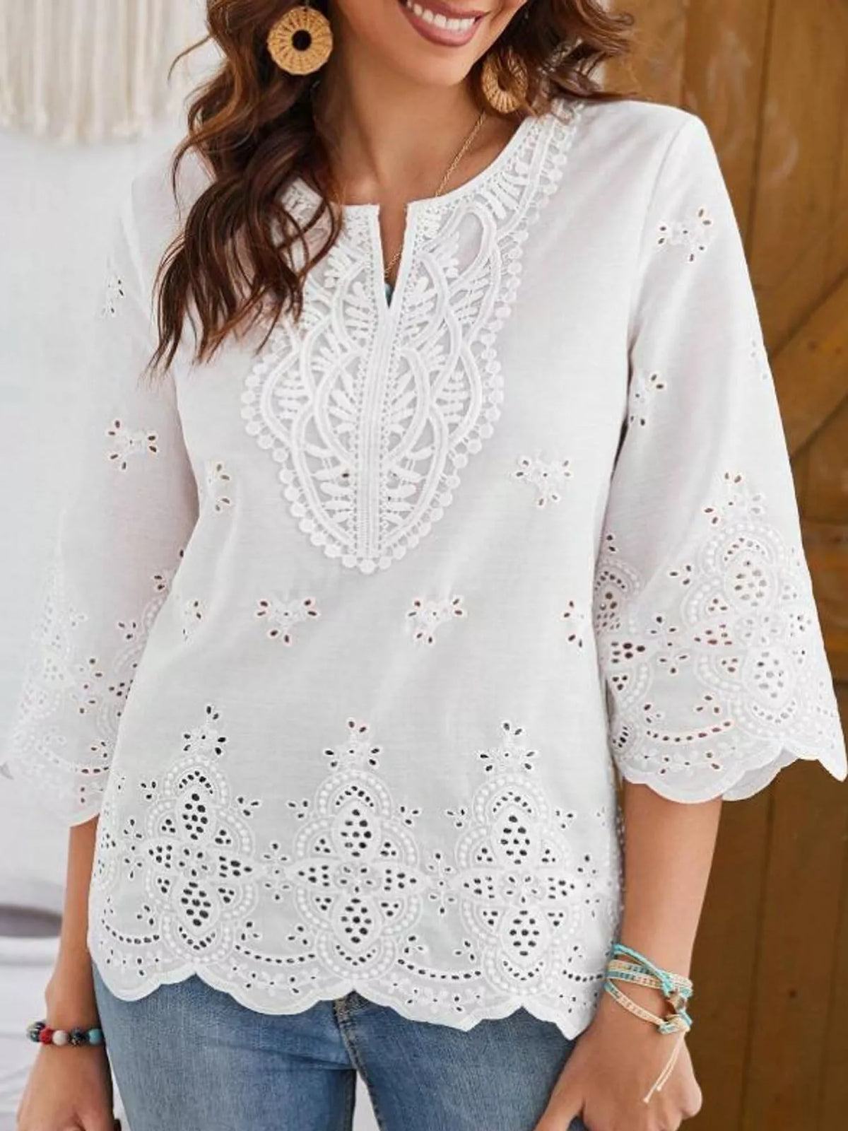 White eyelet embroidered v-neck blouse