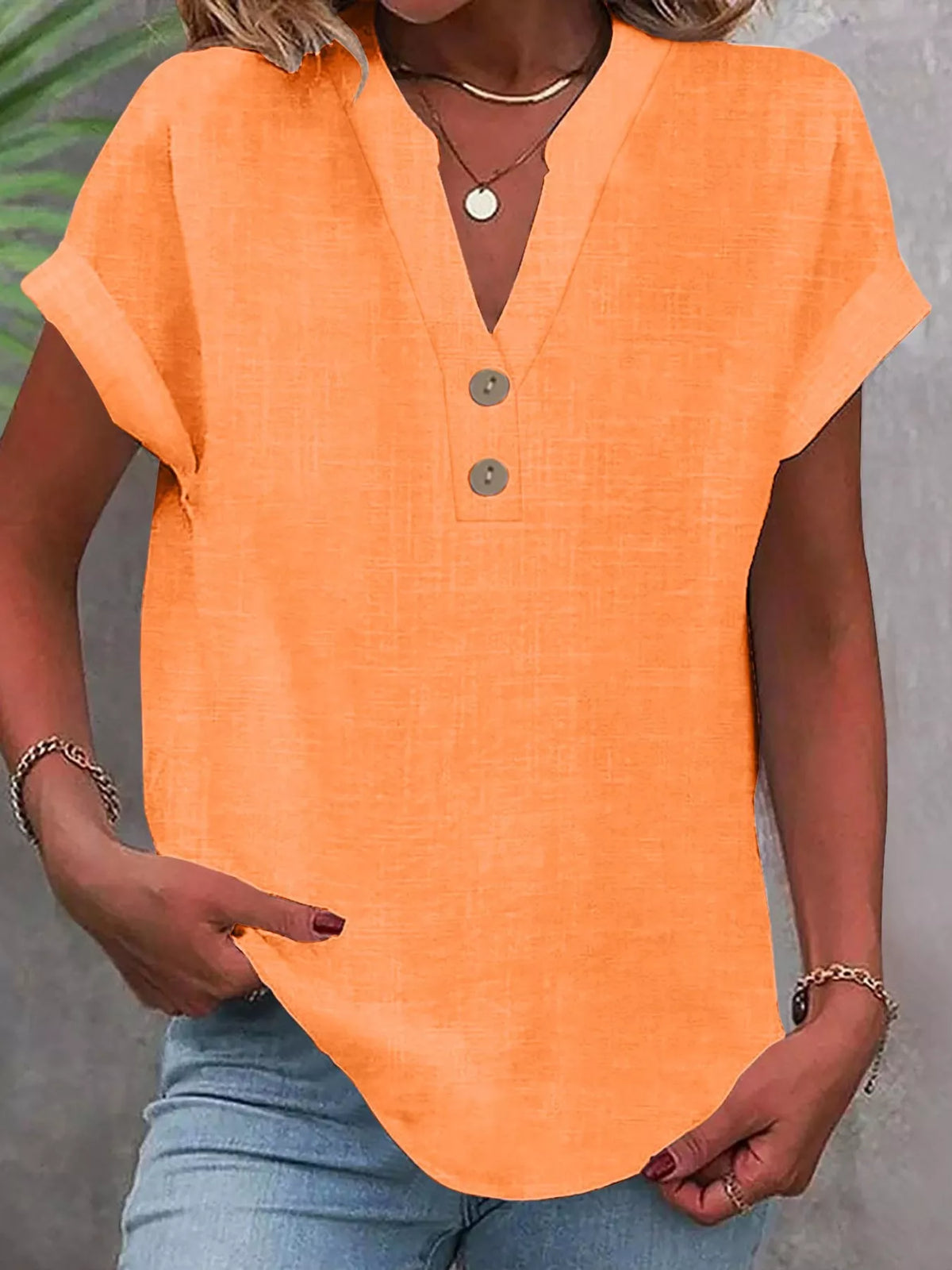 Orange button detail short sleeve blouse, front view