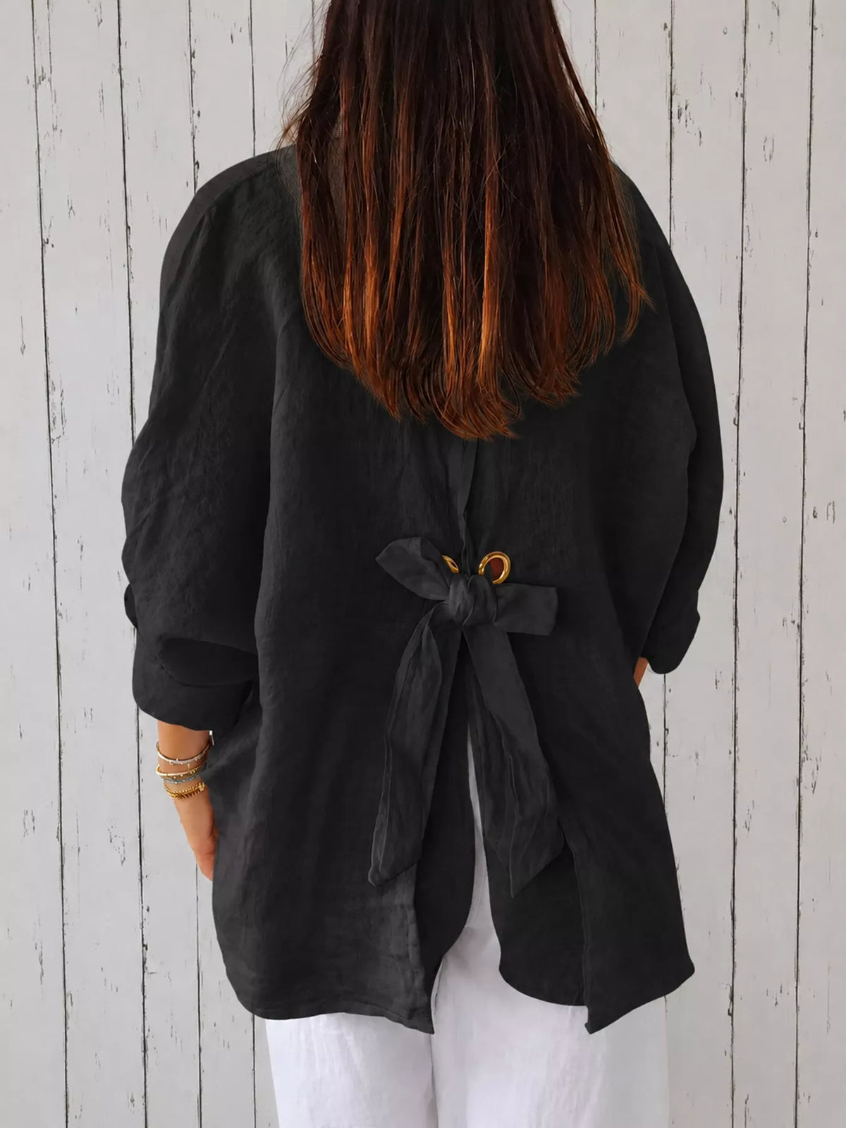 Black loose fit tie back shirt, back view