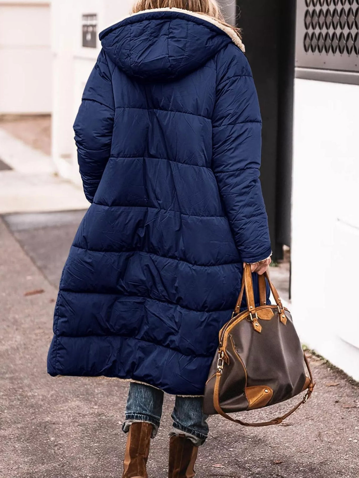 Navy longline sherpa-lined hooded puffer coat, back view