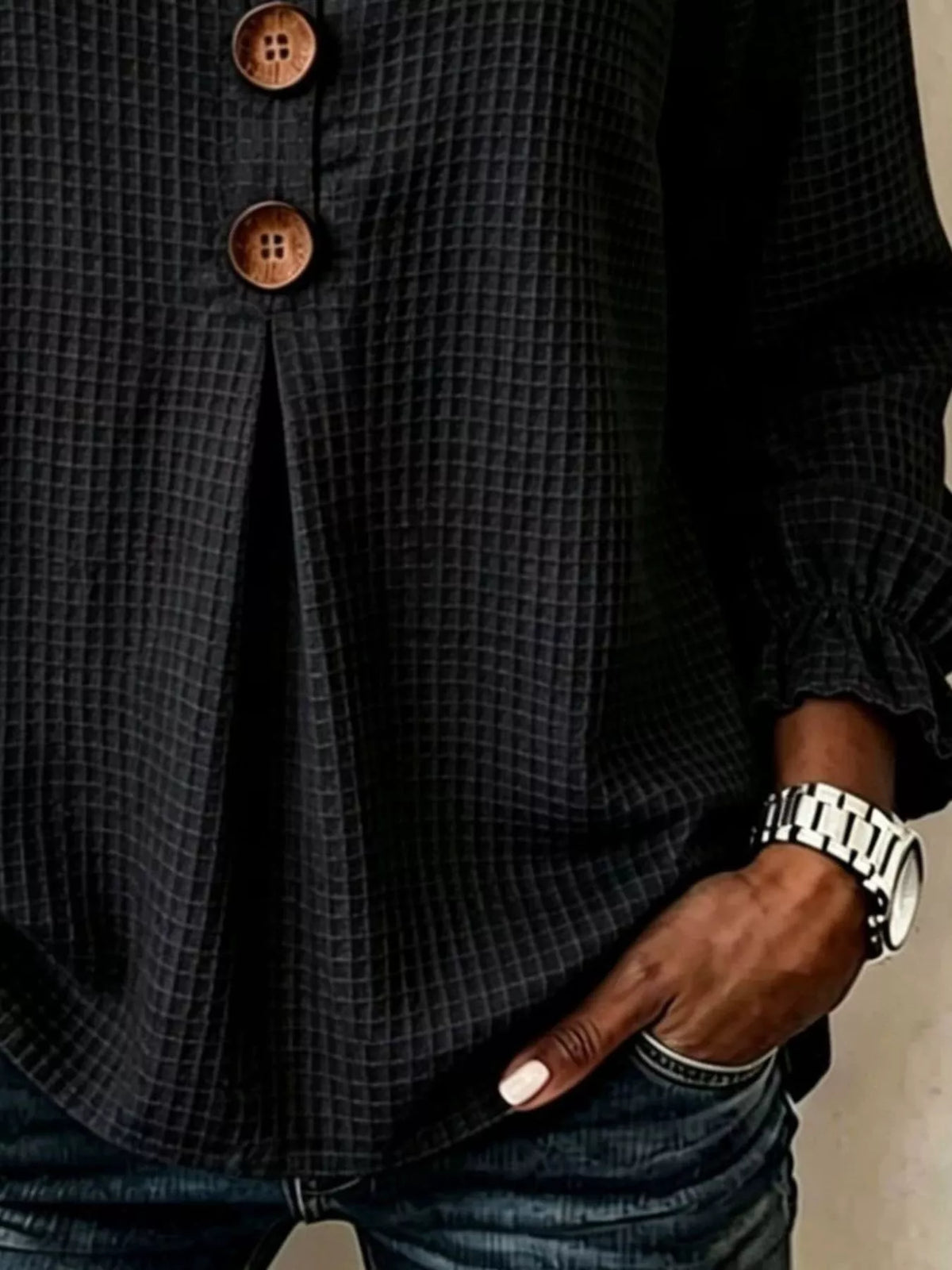 Black waffle knit blouse, waffle texture and flounce cuff