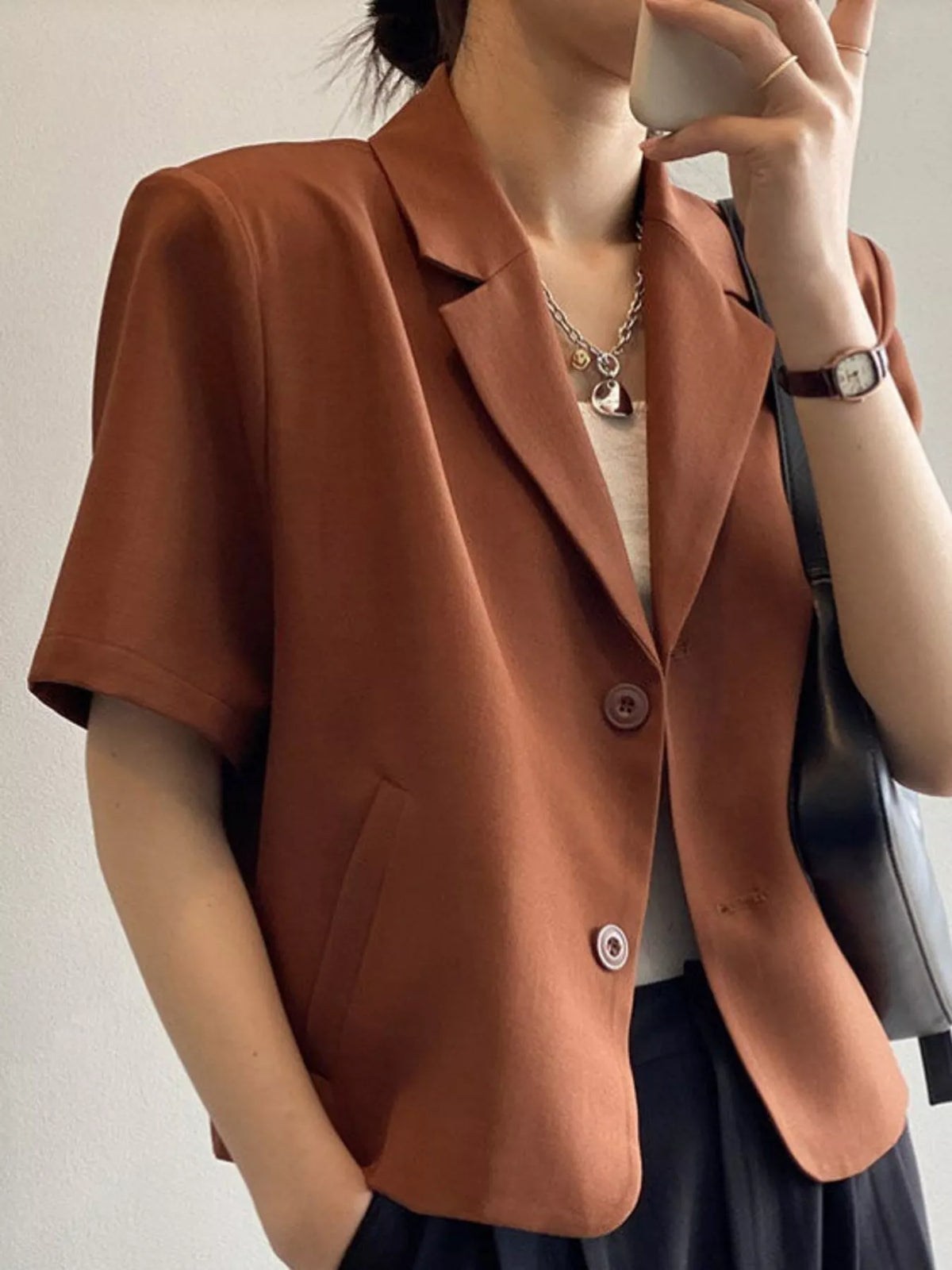 Collared short sleeve blazer, front view on model
