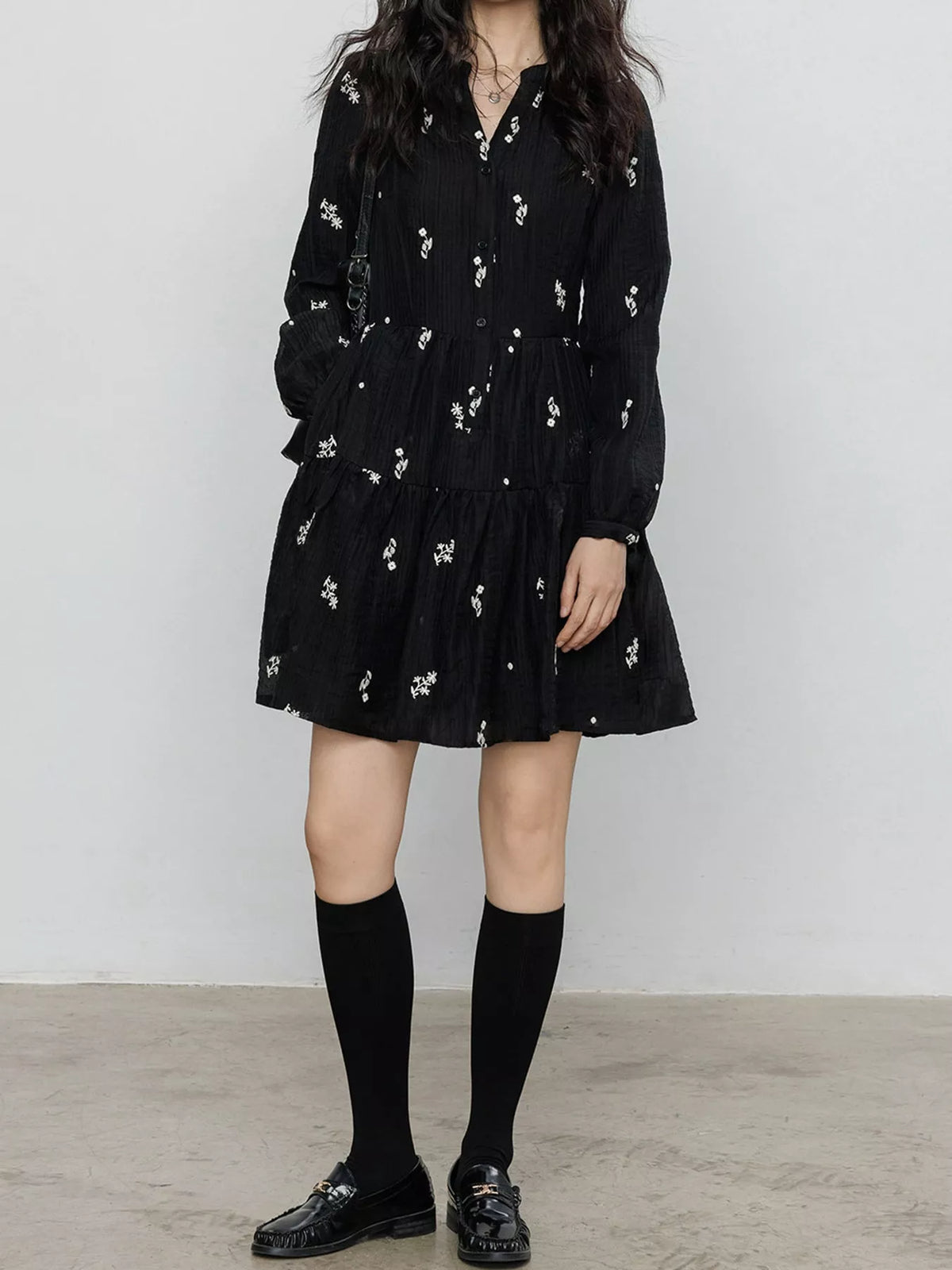 Women's Floral Long Sleeve Mini Dress in black floral — front view