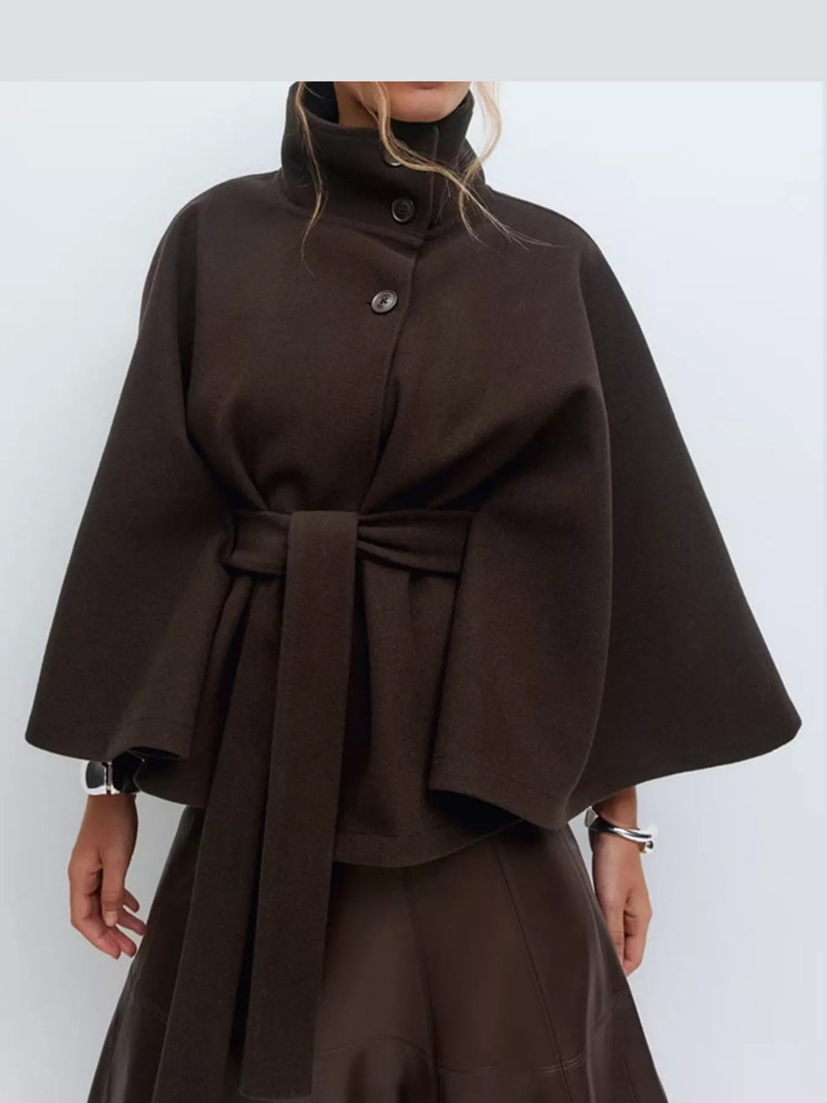 Brown belted button-front cape — front view