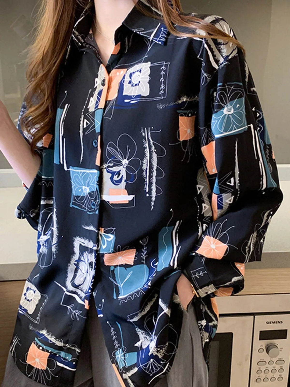 Printed Long Sleeve Button-Down Shirt in black with multicolor print
