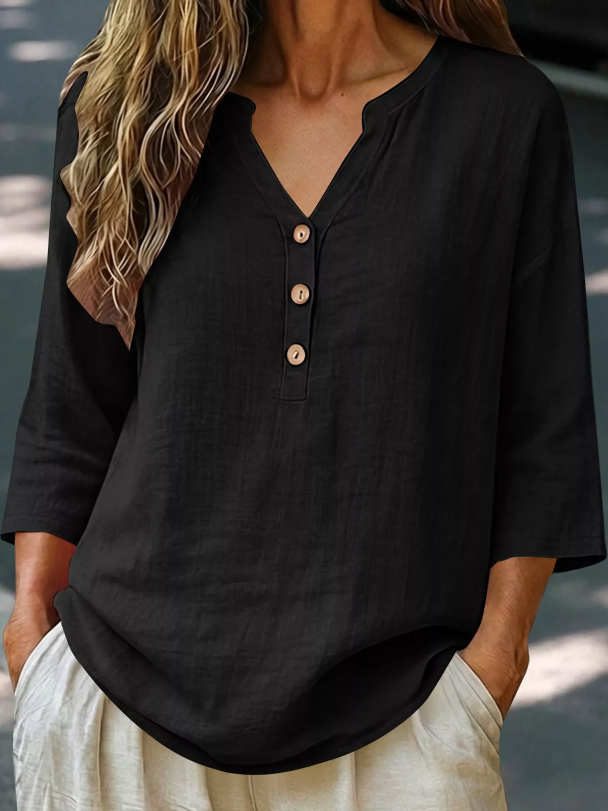 Button Notched 3/4 Sleeve Blouse in black, front view