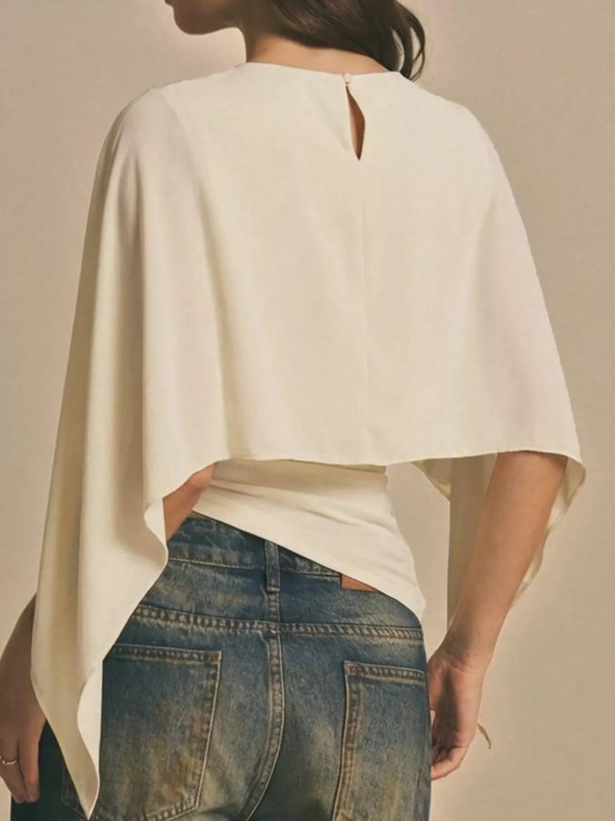 Off-White cape sleeve round neck blouse, back view