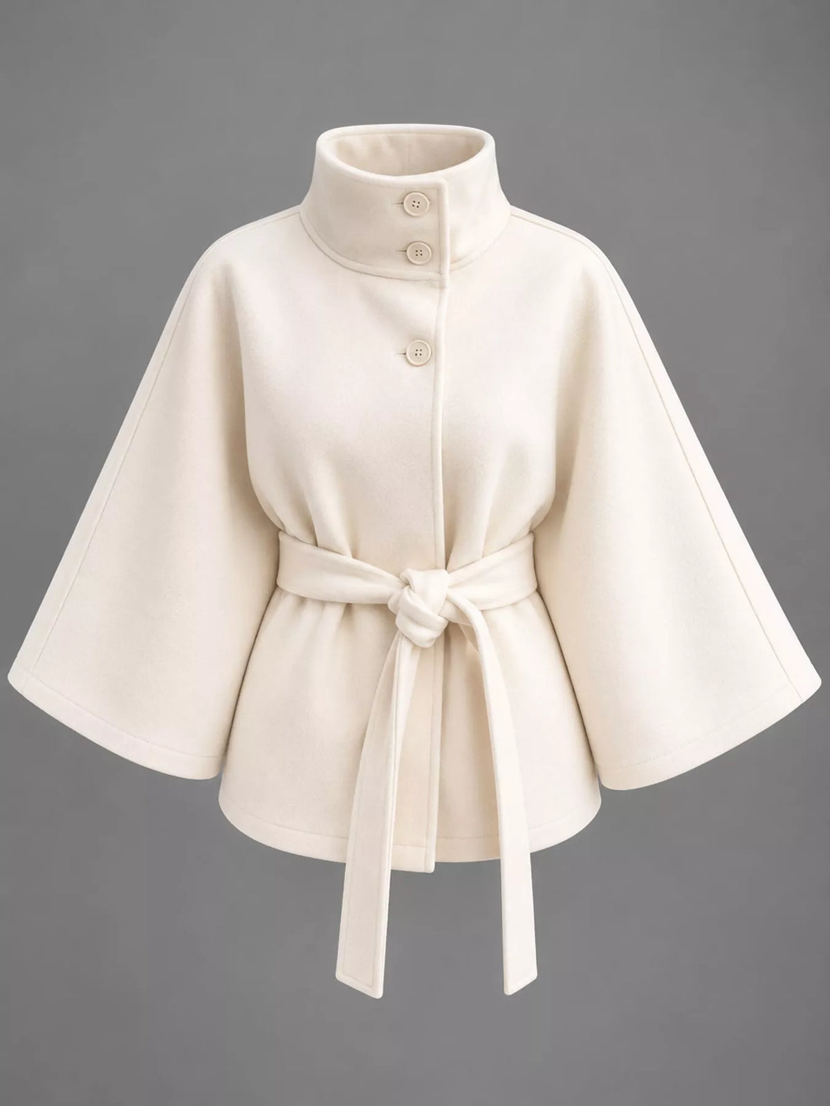 White belted button-front cape — front view