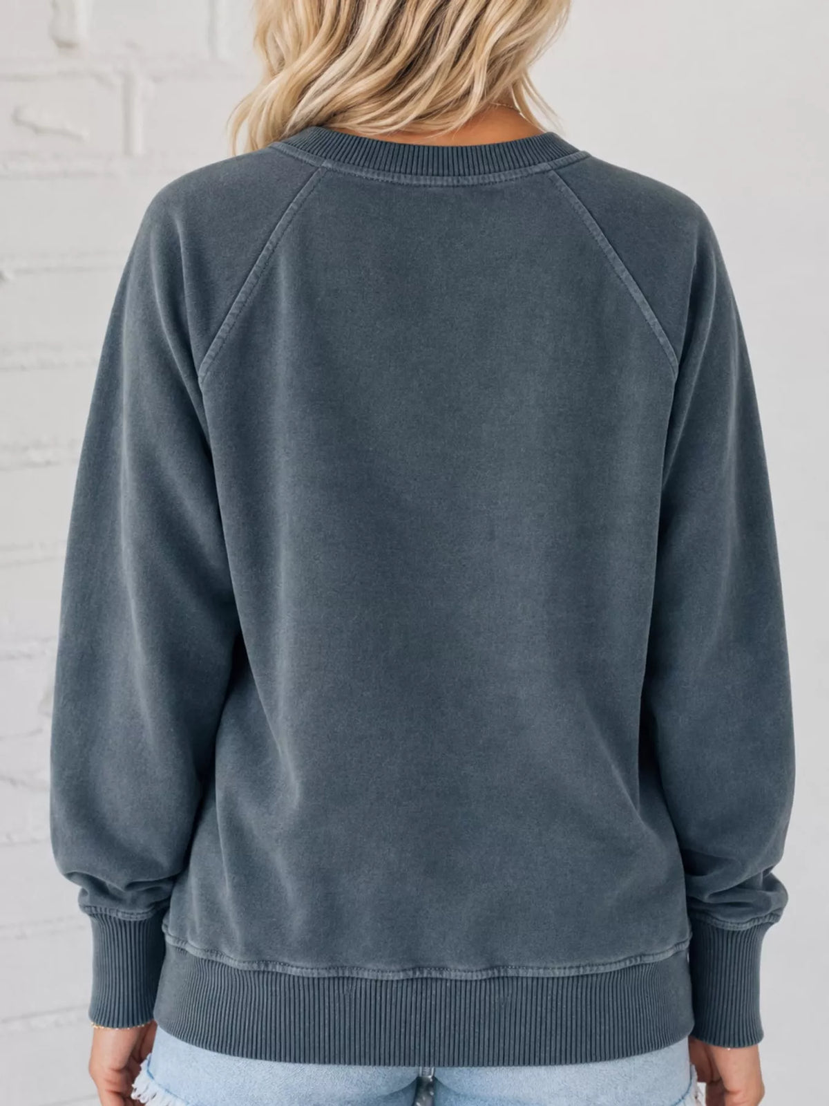 Blue-gray crew neck raglan sleeve sweatshirt, back view