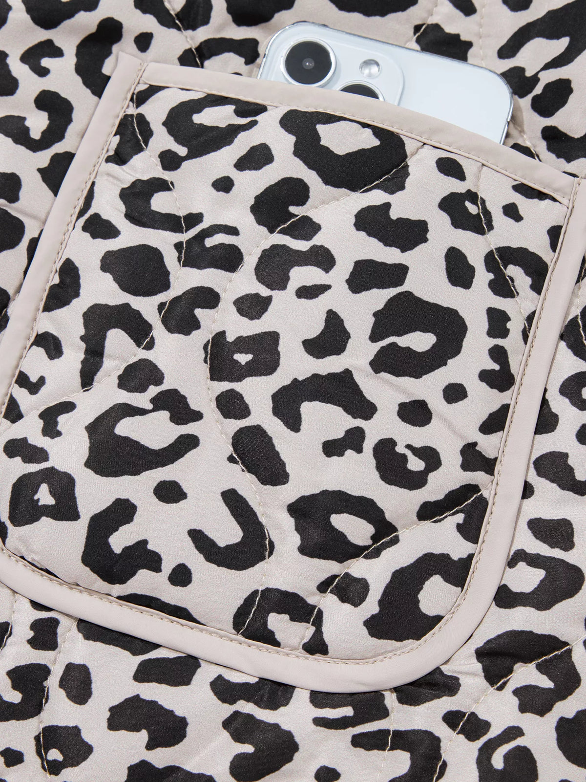 Black and white leopard leopard print long sleeve patch pocket jacket — design and construction details