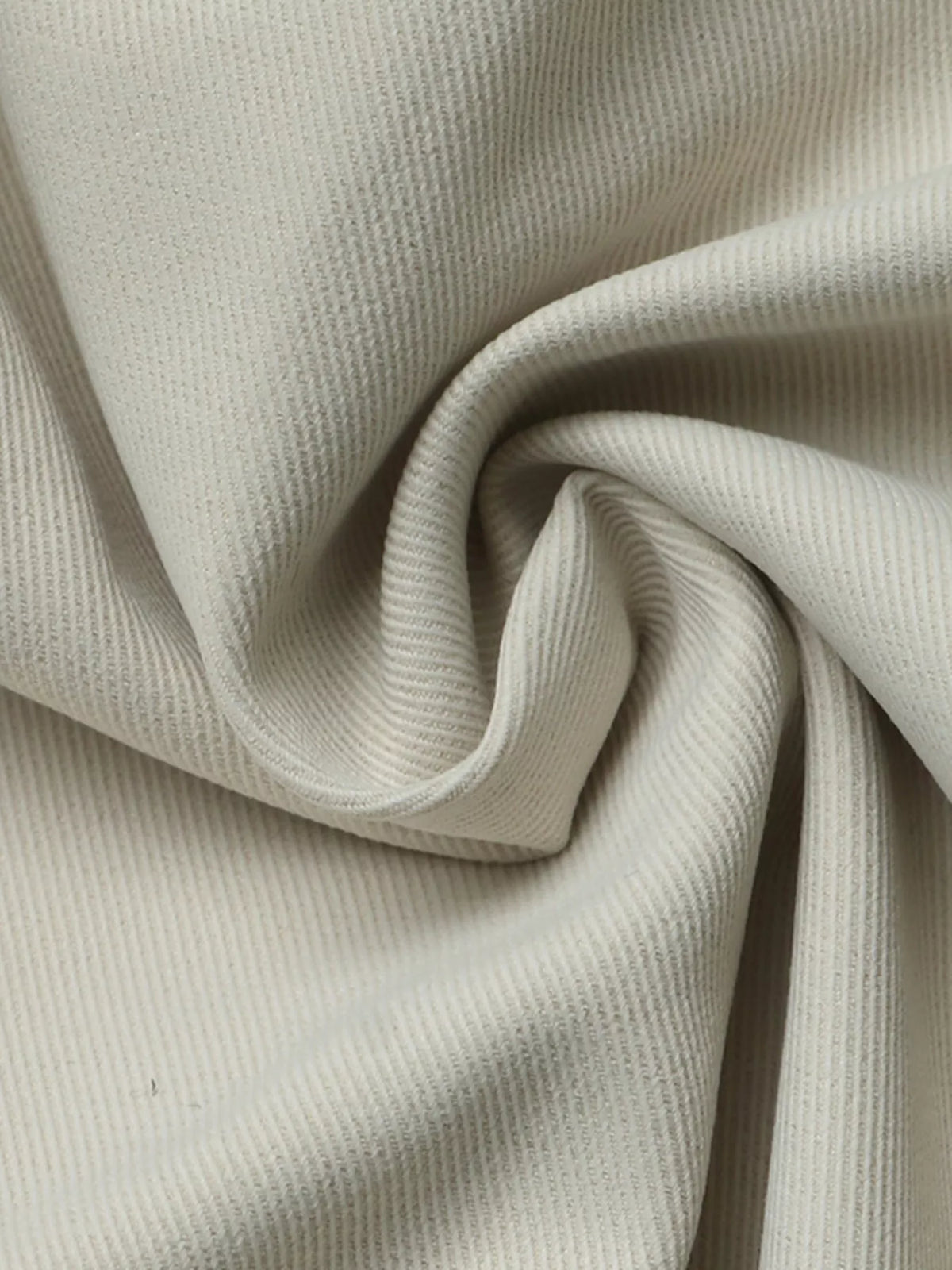 Apricot zip-up cropped jacket, fabric close-up