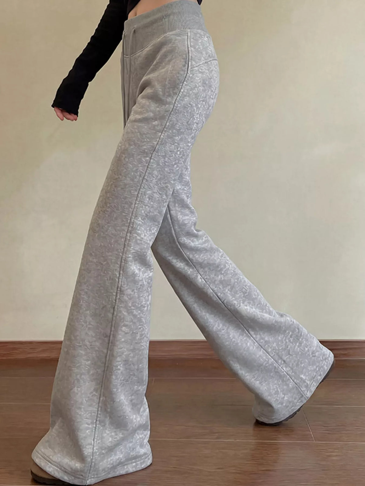 Gray drawstring pants, side view
