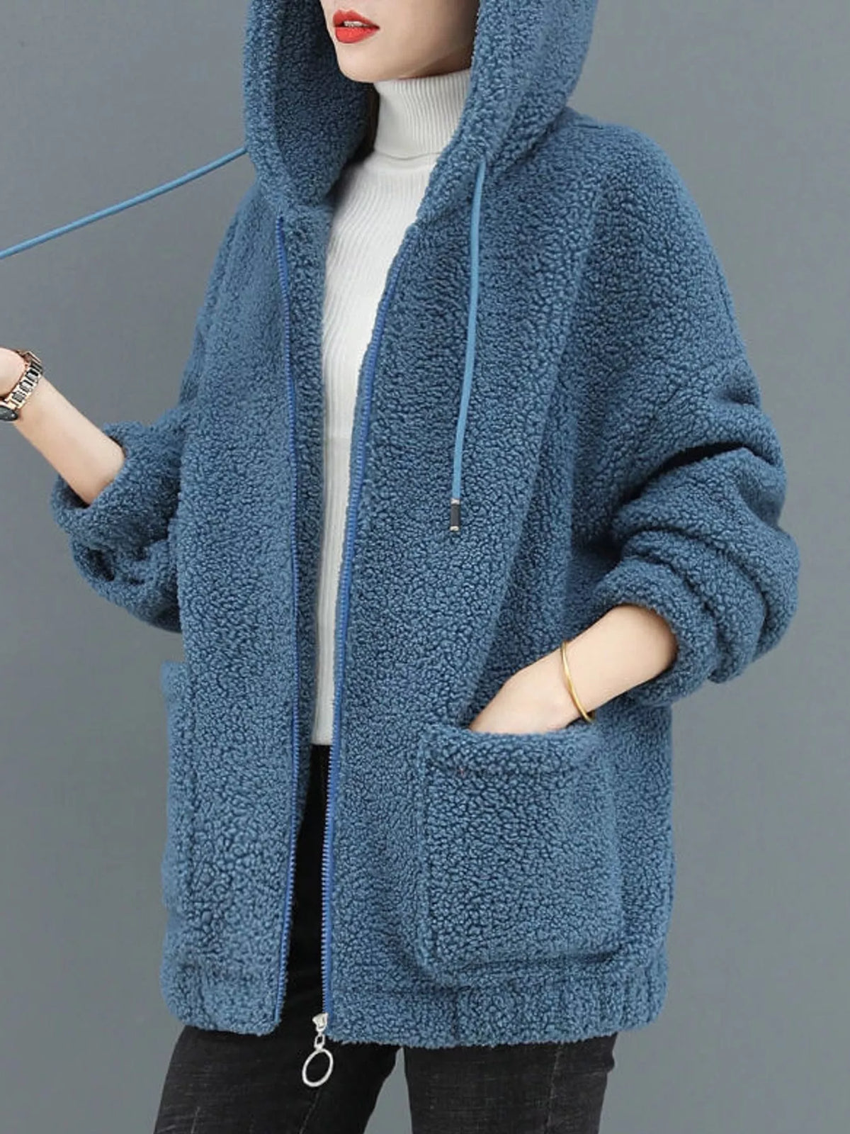 Blue fleece zip-up hoodie with pockets