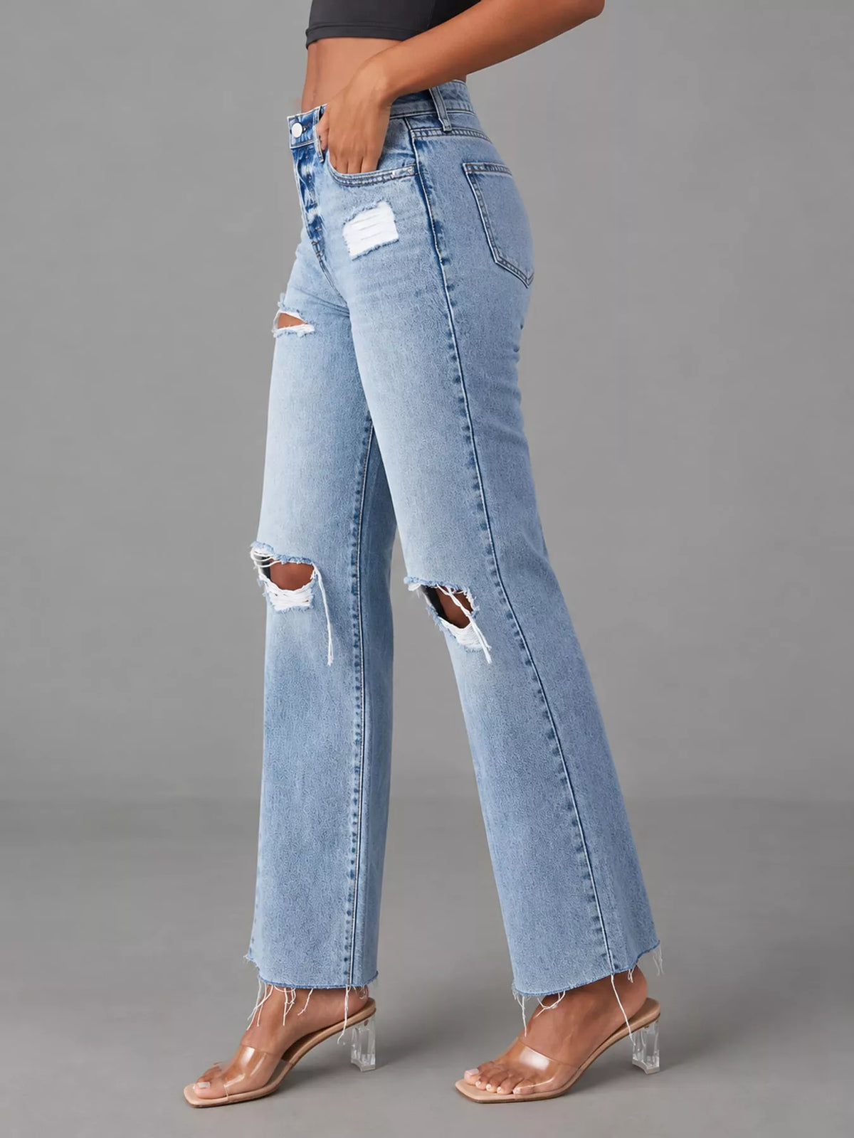 Blue high-waisted distressed jeans