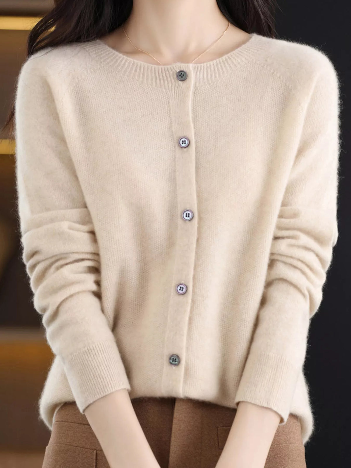 Round neck long sleeve cardigan, front view on model