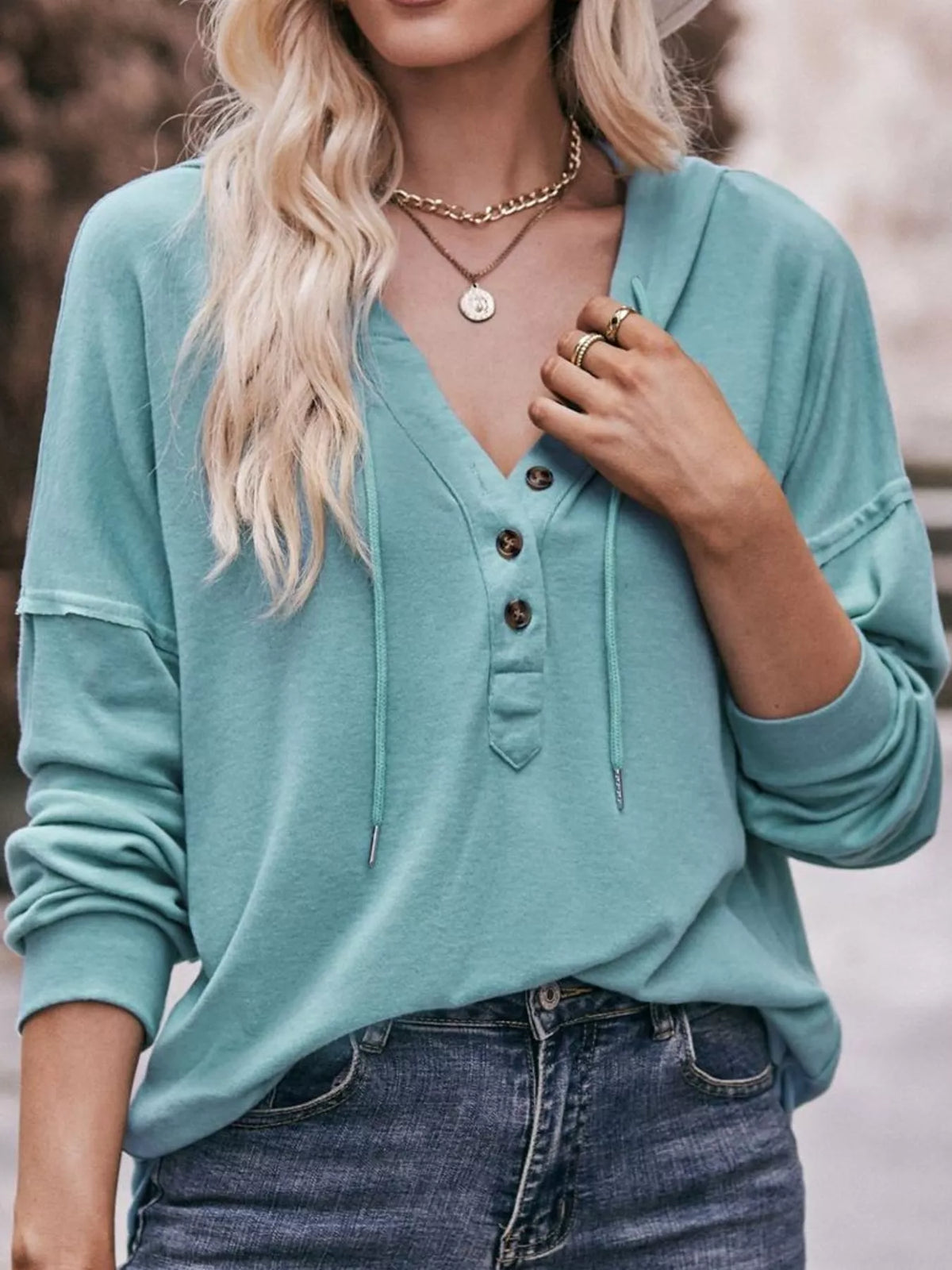 Women's Button Placket Drawstring Dropped Shoulder Hoodie in teal — front view