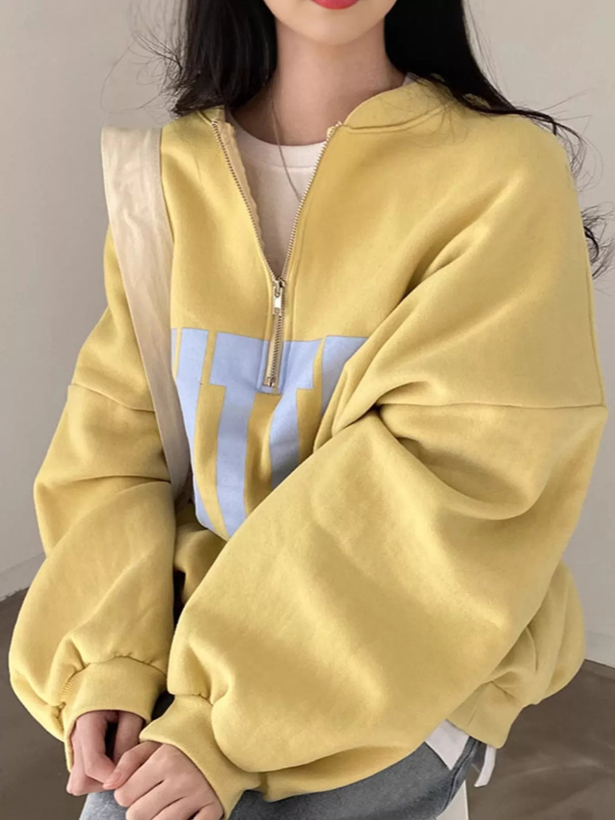 Women's Half-Zip Letter Graphic Sweatshirt in yellow — front view