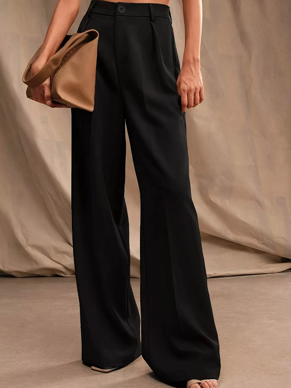 Women's Pleated Wide-Leg Trousers in black — front view