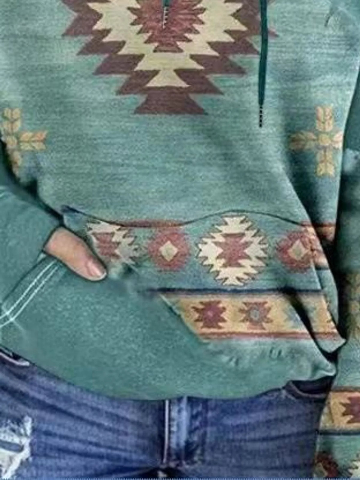 Aztec-print hoodie, teal pocket detail