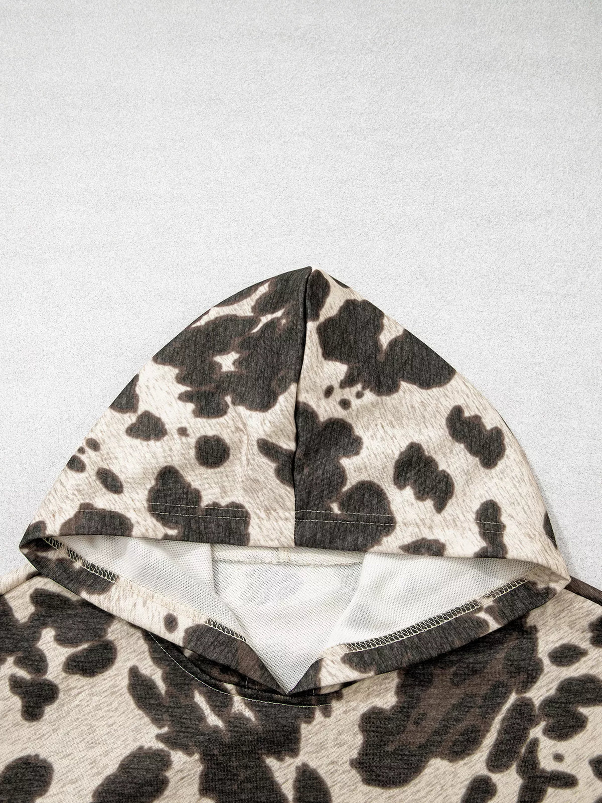 Cow Print Pocket Hoodie in multicolour, construction detail