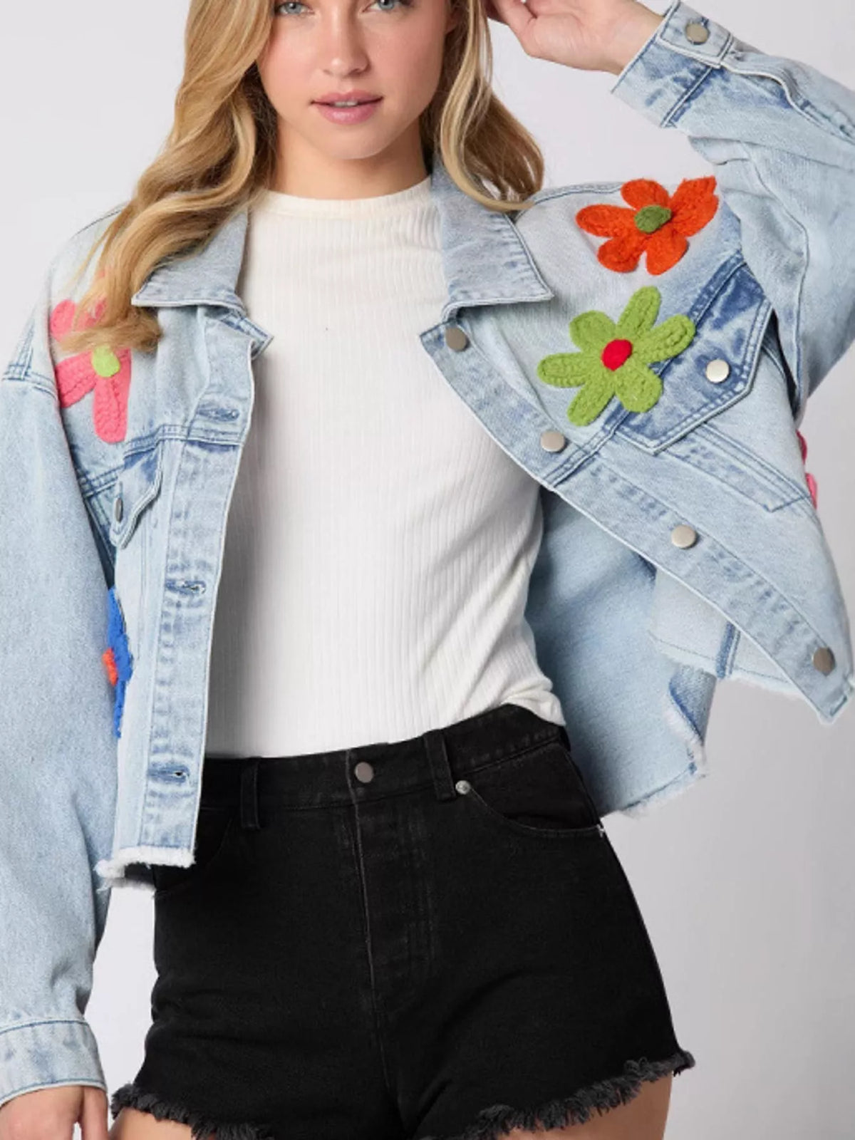 Light blue applique cropped denim jacket with raw hem