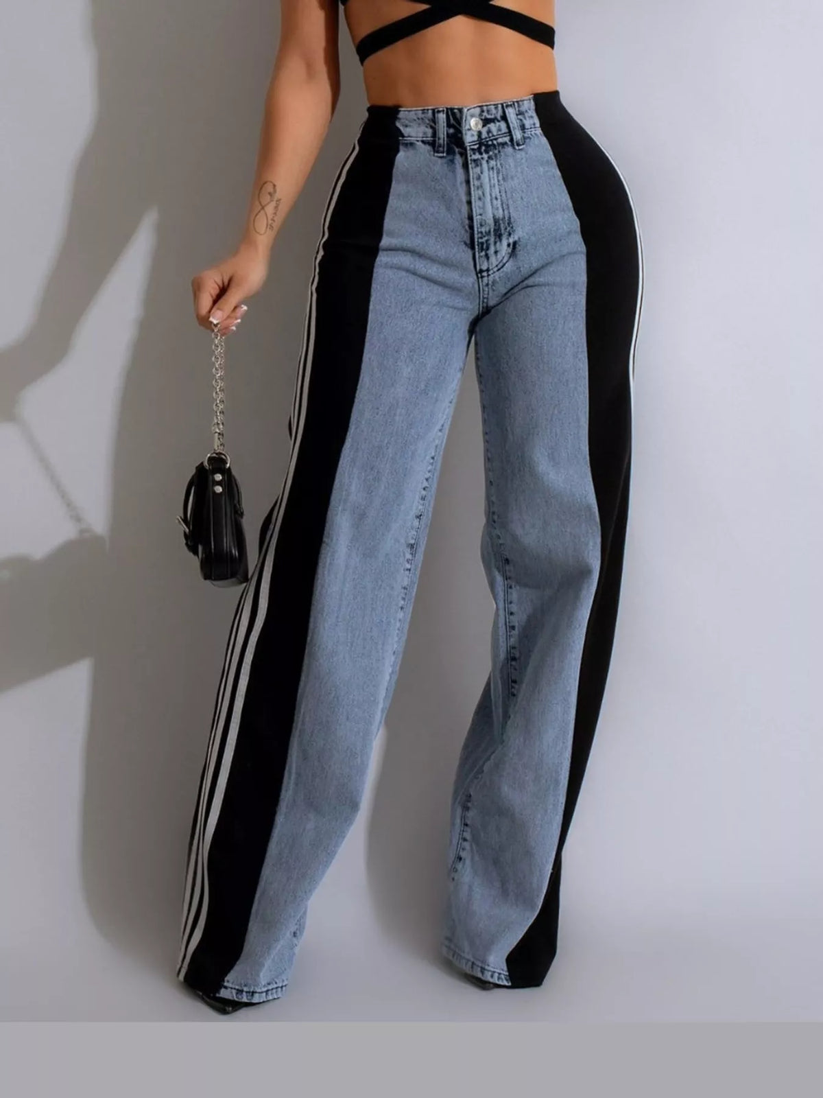 Black high-waisted wide-leg jeans with side stripe detail