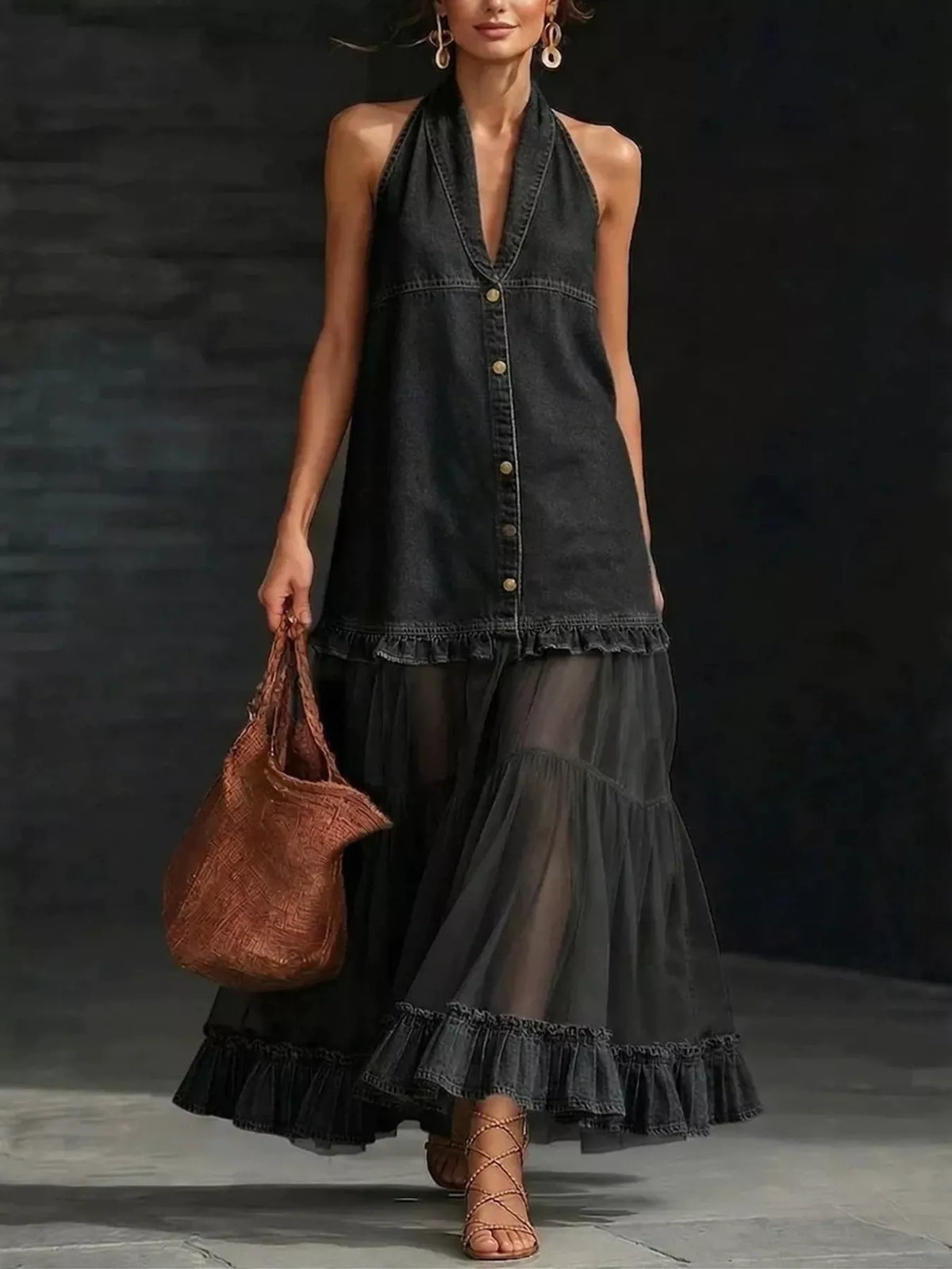 Black halter neck dress with tulle ruffle hem — front view