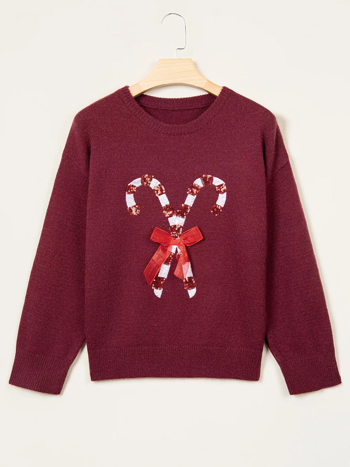 Burgundy christmas sequin candy cane sweater — front view