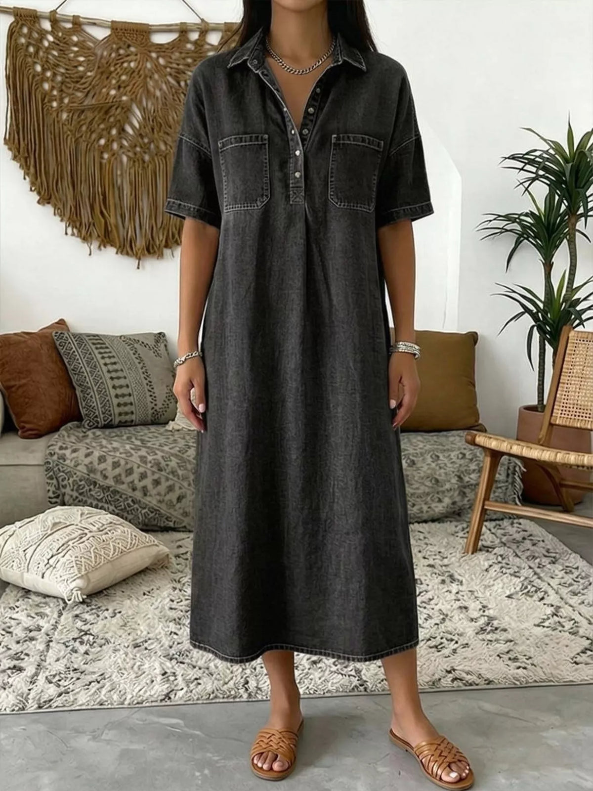Black short sleeve dress with chest pockets — front view