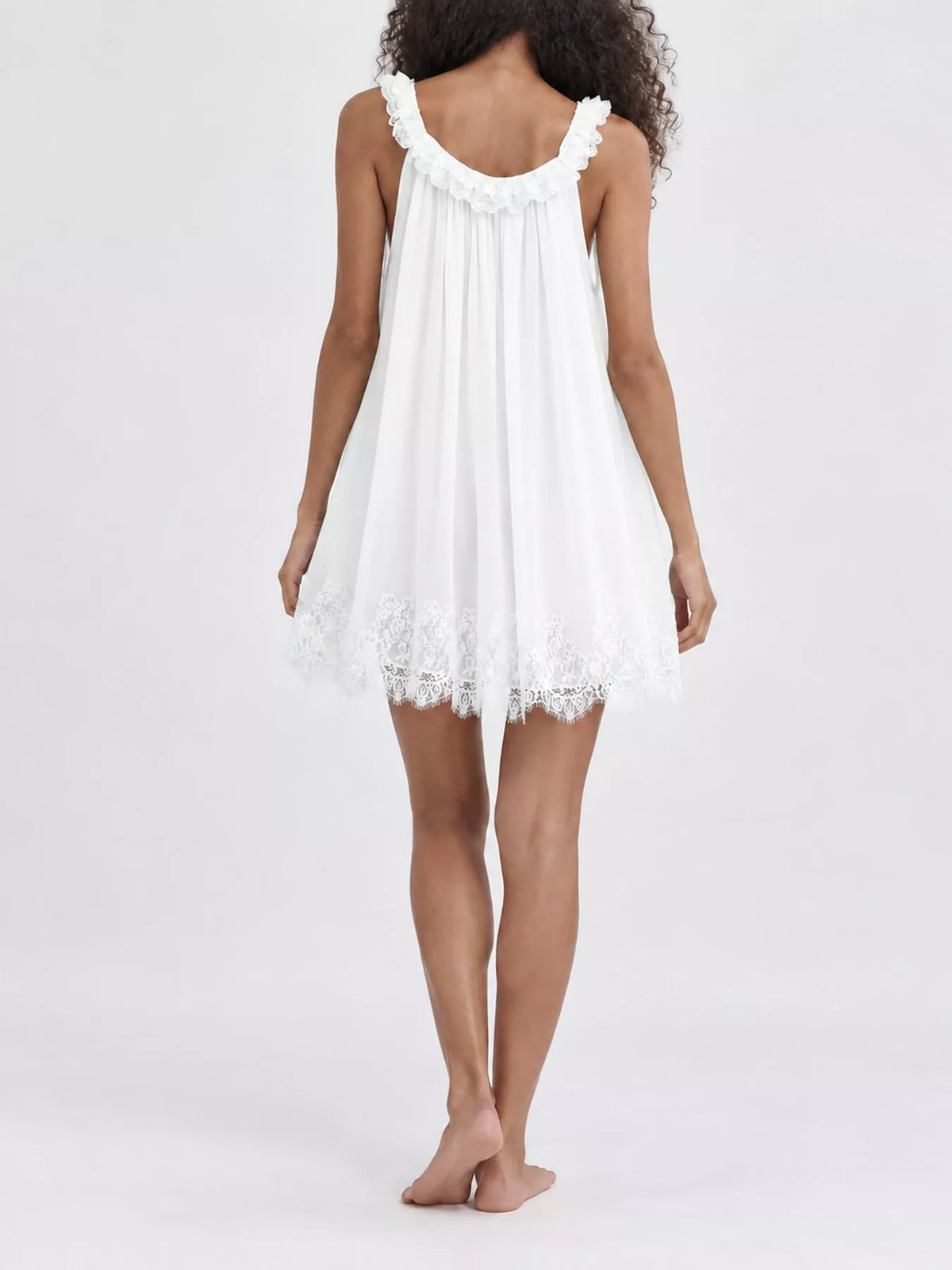 Round neck sleeveless mini dress, back view