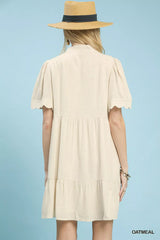 Trendsi Umgee Linen Tiered Babydoll Dress with Scalloped Sleeves -