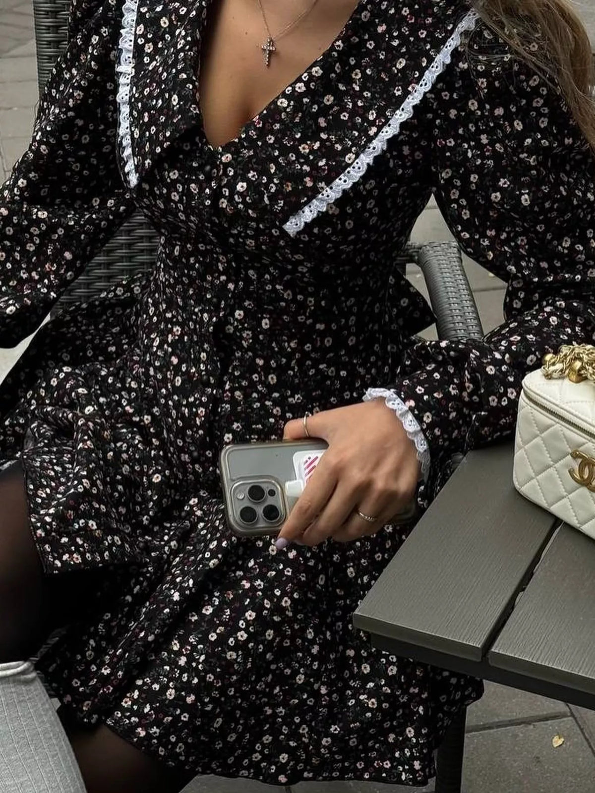 Black Floral Puff-Sleeve Button-Front Midi Dress seated front view