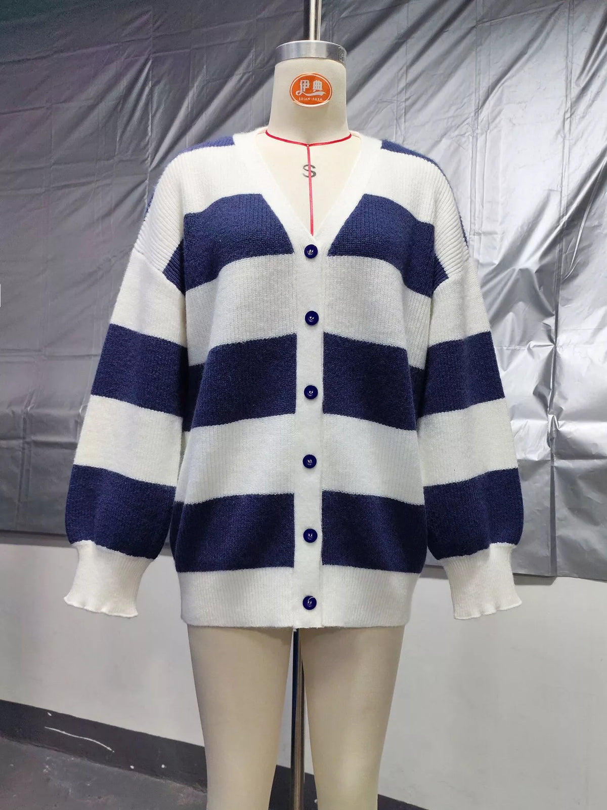 Striped cardigan, navy and white mannequin front