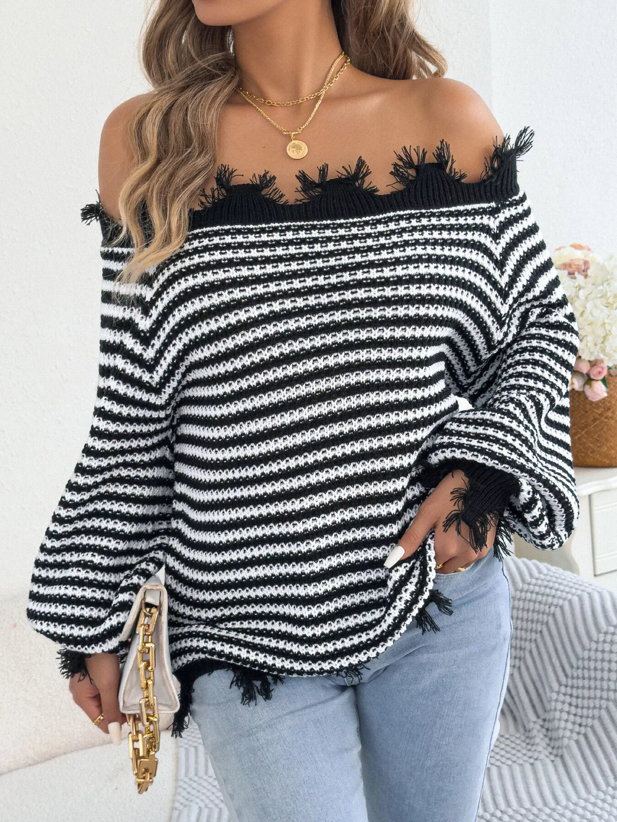 Black off-shoulder frayed hem striped sweater